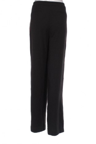 Damskie spodnie H&M, Rozmiar L, Kolor Kolorowy, Cena 67,41 zł