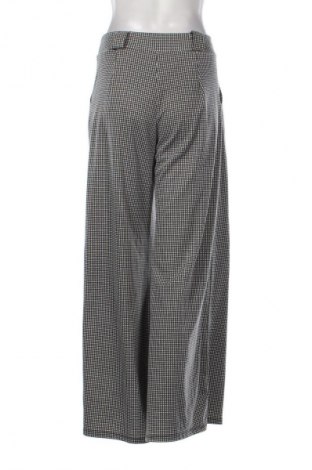 Damskie spodnie NEW COLLECTION, Rozmiar M, Kolor Kolorowy, Cena 94,25 zł