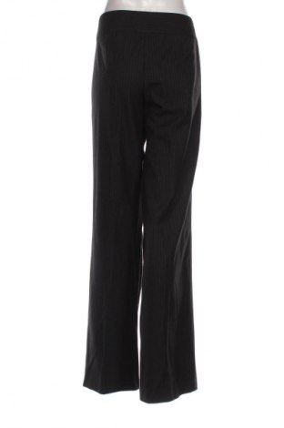 Damskie spodnie United Colors Of Benetton, Rozmiar XL, Kolor Kolorowy, Cena 94,25 zł