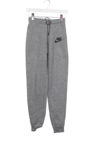 Damskie spodnie sportowe Nike, Rozmiar XS, Kolor Szary, Cena 94,25 zł