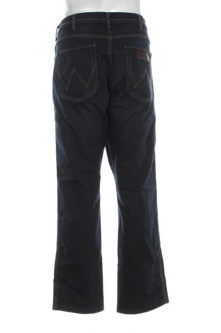 Męskie jeansy Wrangler, Rozmiar L, Kolor Niebieski, Cena 161,99 zł