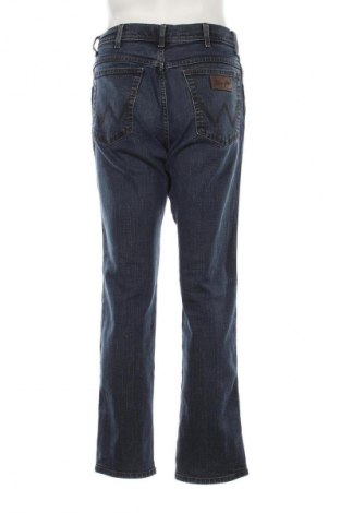 Męskie jeansy Wrangler, Rozmiar M, Kolor Niebieski, Cena 172,99 zł