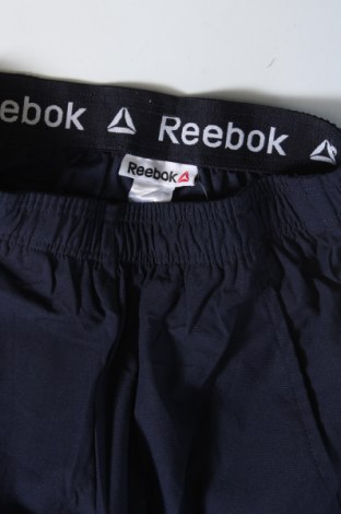 Детско спортно долнище Reebok, Размер 8-9y/ 134-140 см, Цвят Син, Цена 25,49 лв.