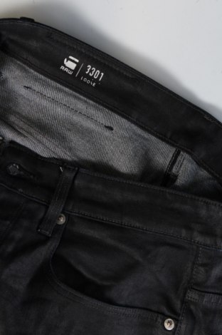 Męskie jeansy G-Star Raw, Rozmiar M, Kolor Czarny, Cena 154,99 zł