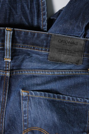 Męskie jeansy Jack & Jones, Rozmiar M, Kolor Niebieski, Cena 53,99 zł