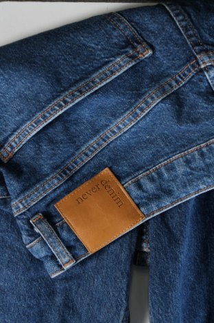 Męskie jeansy Never Denim, Rozmiar M, Kolor Niebieski, Cena 77,99 zł