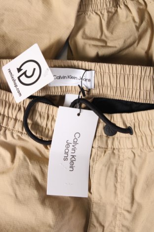 Pánské kalhoty  Calvin Klein Jeans, Velikost M, Barva Béžová, Cena  2 489,00 Kč