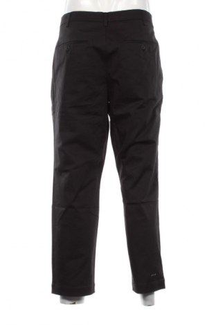 Herrenhose Uniqlo, Größe 4XL, Farbe Schwarz, Preis € 26,99