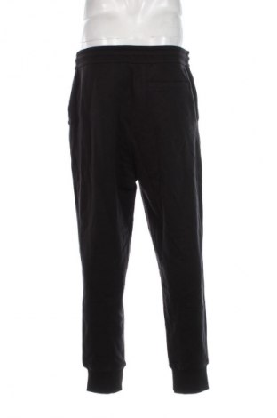 Pantaloni trening de bărbați Calvin Klein Jeans, Mărime XL, Culoare Negru, Preț 542,99 Lei