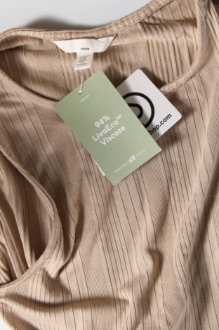 Kleid für Schwangere H&M Mama, Größe M, Farbe Beige, Preis 15,49 €