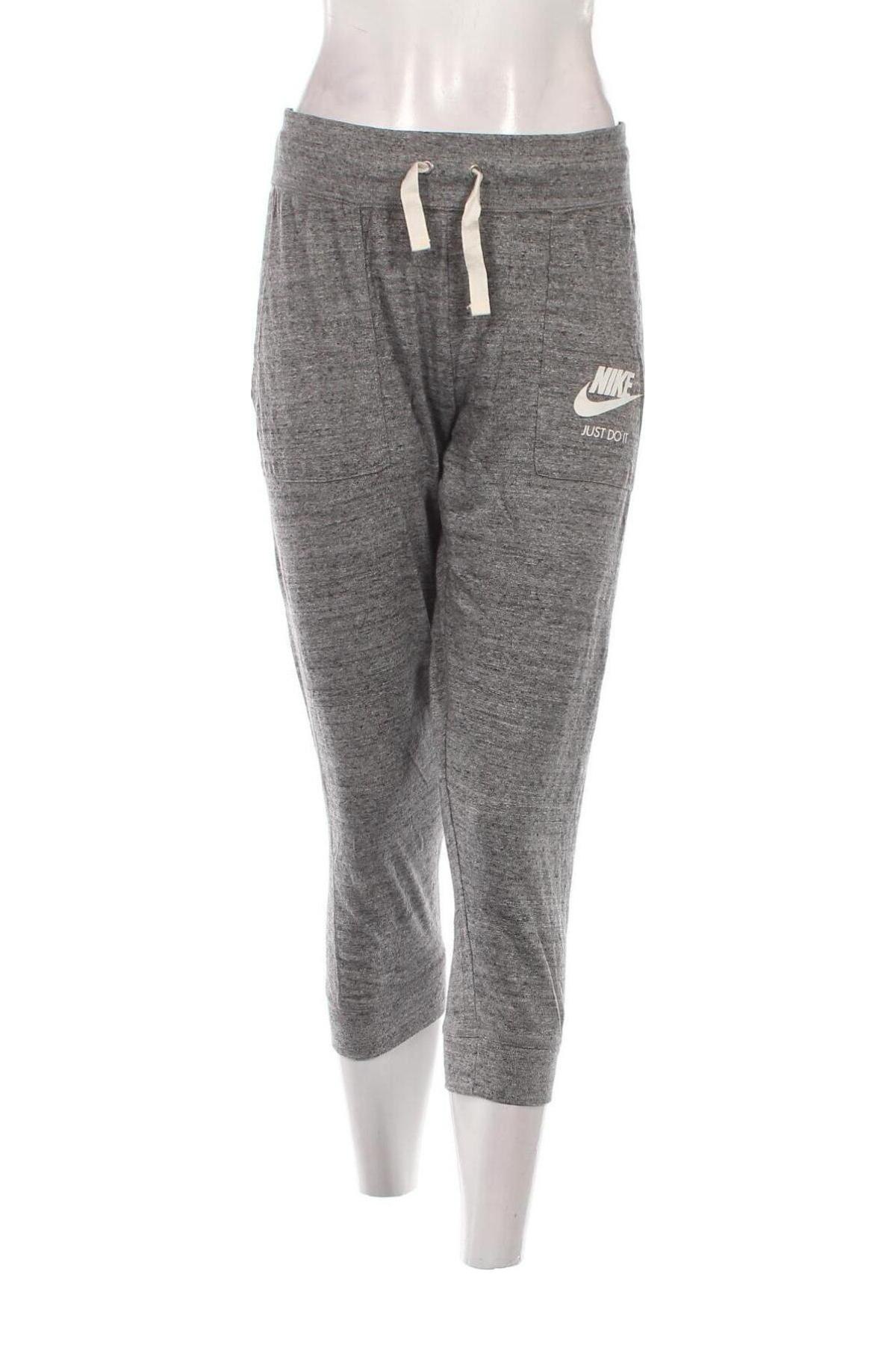 Damen Sporthose Nike, Größe L, Farbe Grau, Preis 23,49 €