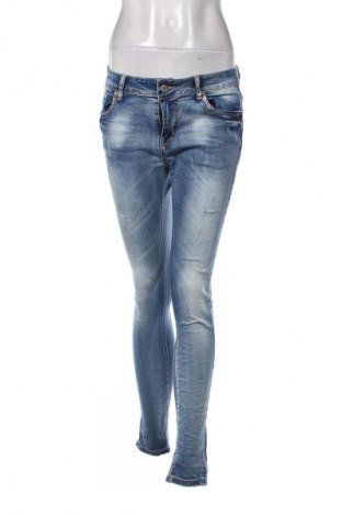Damskie jeansy Miss Grace, Rozmiar L, Kolor Niebieski, Cena 43,99 zł