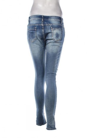 Damskie jeansy Miss Grace, Rozmiar L, Kolor Niebieski, Cena 43,99 zł