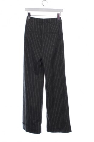 Damskie spodnie Bershka, Rozmiar XS, Kolor Kolorowy, Cena 112,36 zł