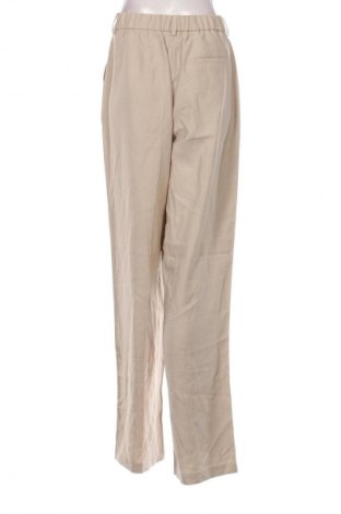 Damskie spodnie Emporio Armani, Rozmiar M, Kolor Beżowy, Cena 503,45 zł