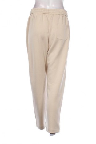 Pantaloni de femei Unbranded, Mărime L, Culoare Bej, Preț 192,50 Lei