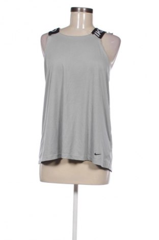 Top sport de damă. Nike, Mărime L, Culoare Gri, Preț 81,11 Lei