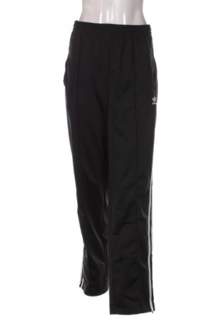 Damskie spodnie sportowe Adidas Originals, Rozmiar L, Kolor Kolorowy, Cena 305,99 zł