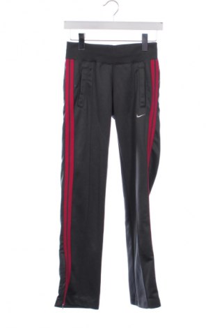 Damskie spodnie sportowe Nike, Rozmiar XS, Kolor Kolorowy, Cena 94,34 zł