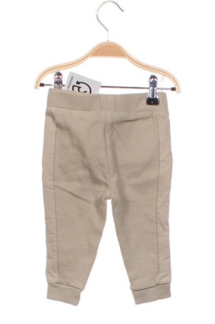 Dziecięce spodnie C&A, Rozmiar 9-12m/ 74-80 cm, Kolor Beżowy, Cena 49,44 zł