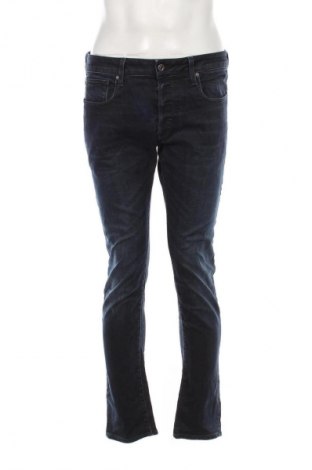 Męskie jeansy G-Star Raw, Rozmiar M, Kolor Niebieski, Cena 594,02 zł