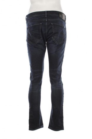Męskie jeansy G-Star Raw, Rozmiar M, Kolor Niebieski, Cena 594,02 zł