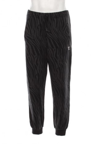 Męskie spodnie sportowe Adidas Originals, Rozmiar S, Kolor Kolorowy, Cena 110,34 zł