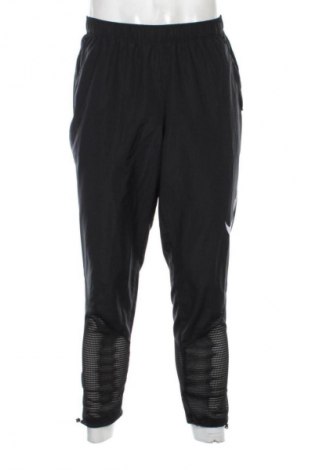 Męskie spodnie sportowe Nike, Rozmiar M, Kolor Czarny, Cena 284,99 zł