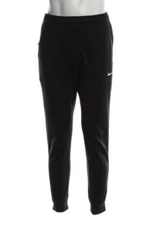 Męskie spodnie sportowe Nike, Rozmiar S, Kolor Czarny, Cena 157,99 zł