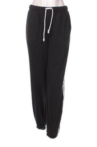 Γυναικείο αθλητικό παντελόνι Levi's, Μέγεθος M, Χρώμα Μαύρο, Τιμή 44,85 €