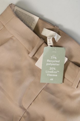 Damskie spodnie H&M, Rozmiar XS, Kolor Beżowy, Cena 105,43 zł