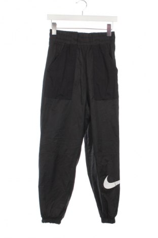 Damskie spodnie sportowe Nike, Rozmiar XS, Kolor Czarny, Cena 131,99 zł