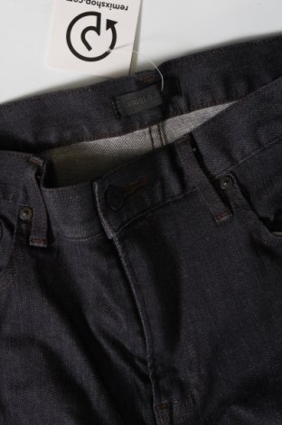 Męskie jeansy Uniqlo, Rozmiar M, Kolor Niebieski, Cena 77,99 zł