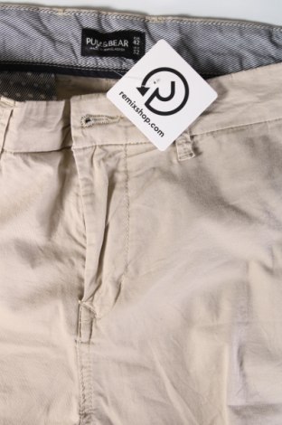 Męskie spodnie Pull&Bear, Rozmiar M, Kolor Beżowy, Cena 44,99 zł