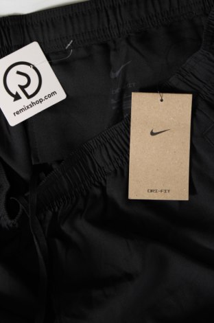 Męskie spodnie sportowe Nike, Rozmiar XL, Kolor Czarny, Cena 224,99 zł