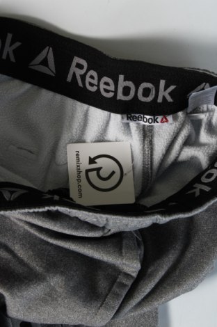 Męskie spodnie sportowe Reebok, Rozmiar M, Kolor Szary, Cena 100,99 zł