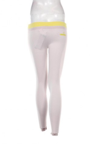 Damskie legginsy Adidas By Stella McCartney, Rozmiar M, Kolor Popielaty róż, Cena 233,70 zł