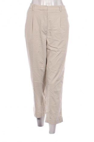 Damskie spodnie H&M, Rozmiar L, Kolor Beżowy, Cena 110,07 zł