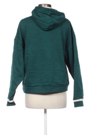 Damen Sweatshirt PUMA, Größe L, Farbe Grün, Preis 34,99 €