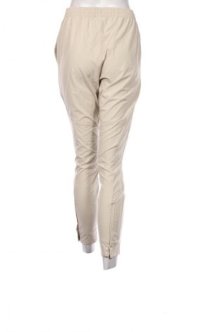 Dámske tepláky New Balance, Veľkosť S, Farba Béžová, Cena  25,95 €