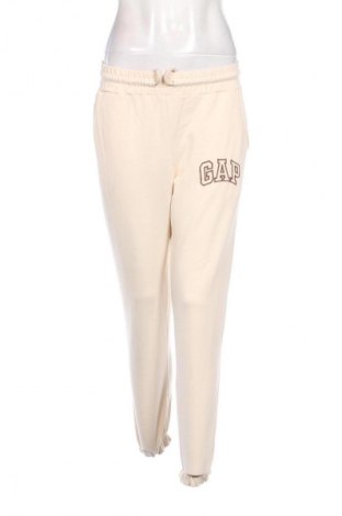 Damskie spodnie sportowe New Fashion, Rozmiar S, Kolor ecru, Cena 66,67 zł