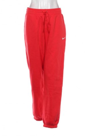 Damskie spodnie sportowe Nike, Rozmiar M, Kolor Czerwony, Cena 305,99 zł