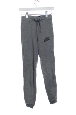 Damskie spodnie sportowe Nike, Rozmiar XS, Kolor Szary, Cena 155,99 zł