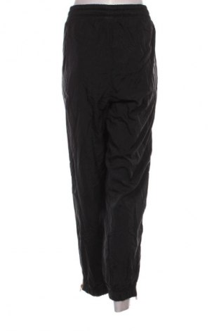 Dámské tepláky Nike, Velikost L, Barva Černá, Cena  759,00 Kč