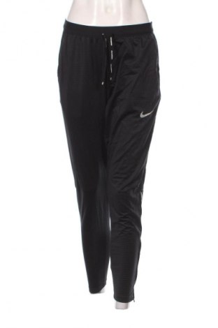 Pantaloni trening de femei Nike, Mărime M, Culoare Negru, Preț 175,99 Lei