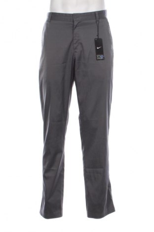 Herrenhose Nike, Größe L, Farbe Grau, Preis 79,80 €