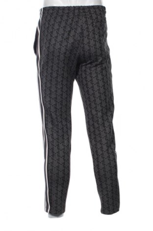 Pantaloni trening de bărbați Lacoste, Mărime S, Culoare Multicolor, Preț 408,99 Lei