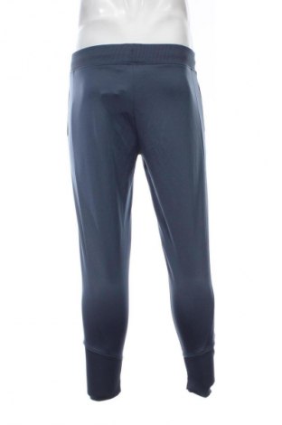 Męskie spodnie sportowe Under Armour, Rozmiar S, Kolor Niebieski, Cena 152,99 zł