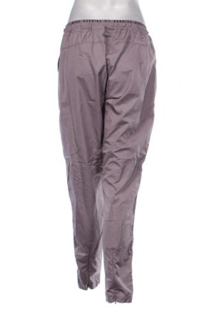 Pantaloni de femei Nike, Mărime M, Culoare Mov deschis, Preț 162,99 Lei