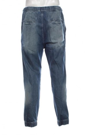 Męskie jeansy H&M Divided, Rozmiar M, Kolor Niebieski, Cena 38,99 zł